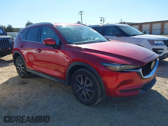 2018 Mazda CX-5 Grand Touring with VIN JM3KFADM3J0380826, listed as a IAAI auction lot 41888097 with 70,529 mi miles. Bid and sale history available at carsss.com. Image 1.