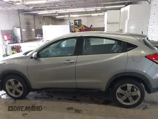 2021 Honda HR-V LX with VIN 3CZRU6H33MM746713, listed as a IAAI auction lot 41973303 with 56,476 mi miles. Bid and sale history available at carsss.com. Image 15.