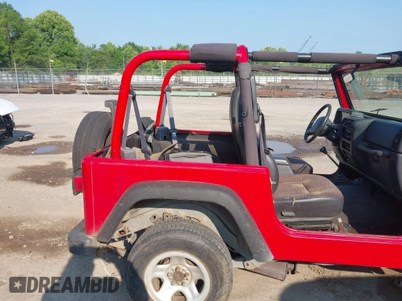 2000 Jeep Wrangler SE with VIN 1J4FA29P6YP775127, listed as a IAAI auction lot 42377387 with Not provided miles and . Bid and sale history available at DreamBid. Image 8.