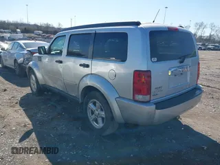 2007 Dodge Nitro SLT with VIN 1D8GT58K77W614092, listed as a IAAI auction lot 41645991 with 129,931 mi miles. Bid and sale history available at carsss.com. Image 3.