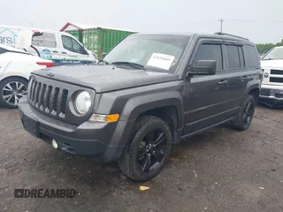 2015 Jeep Patriot Sport with VIN 1C4NJRBBXFD206899, listed as a IAAI auction lot 42434469 with 150,817 mi miles and . Bid and sale history available at DreamBid. Image 2.
