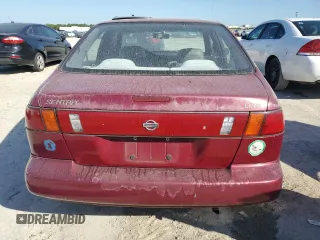 1996 Nissan Sentra XE z VIN 3N1AB41D3TL027288, wystawiony jako Copart lot #77255804 z przebiegiem 132 033 mil mil oraz Czysty tytuł • Clean title. Historia ofert i sprzedaży dostępna na DreamBid. Obrazek 6.