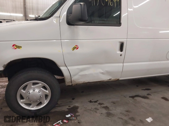 2011 Ford Econoline Cargo Commercial with VIN 1FTNE1EW9BDB06341, listed as a IAAI auction lot 41704699 with 207,452 mi miles and . Bid and sale history available at carsss.com. Image 13.