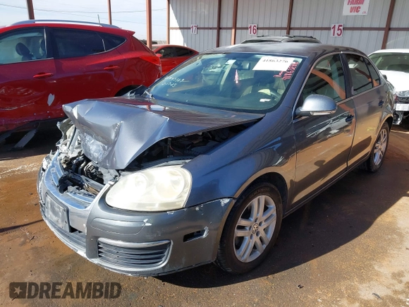 2007 Volkswagen Jetta 2.5 z VIN 3VWRF71K37M101410, wystawiony jako IAAI lot #41863276 z przebiegiem 195 616 mil mil oraz . Historia ofert i sprzedaży dostępna na DreamBid. Obrazek 17.