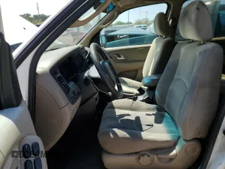 2002 Mazda Tribute LX with VIN 4F2YU09132KM10219, listed as a Copart auction lot 70619724 with 202,687 mi miles and Salvage Title. Bid and sale history available at carsss.com. Image 7.