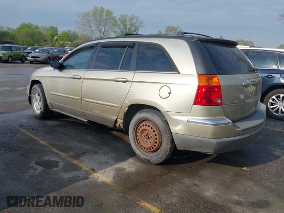 2005 Chrysler Pacifica Touring with VIN 2C8GF68465R252922, listed as a IAAI auction lot 42061282 with 134,543 mi miles and . Bid and sale history available at DreamBid. Image 3.