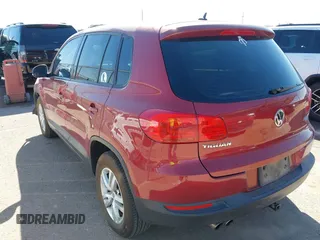 2013 Volkswagen Tiguan SE z VIN WVGBV7AX2DW006816, wystawiony jako IAAI lot #41702820 z przebiegiem 129 757 mil mil oraz . Historia ofert i sprzedaży dostępna na DreamBid. Obrazek 3.