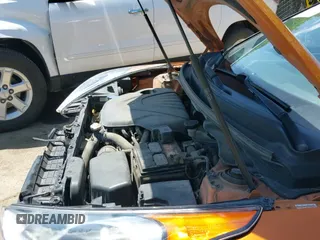 2013 Hyundai Veloster w/Black Int z VIN KMHTC6AD8DU175373, wystawiony jako IAAI lot #42567057 z przebiegiem 141 693 mil mil oraz . Historia ofert i sprzedaży dostępna na DreamBid. Obrazek 21.