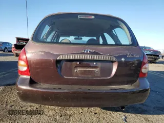 1999 Hyundai Elantra z VIN KMHJW25F1XU128645, wystawiony jako Copart lot #82970984 z przebiegiem 118 048 mil mil oraz Szkoda całkowita • Salvage title. Historia ofert i sprzedaży dostępna na DreamBid. Obrazek 6.