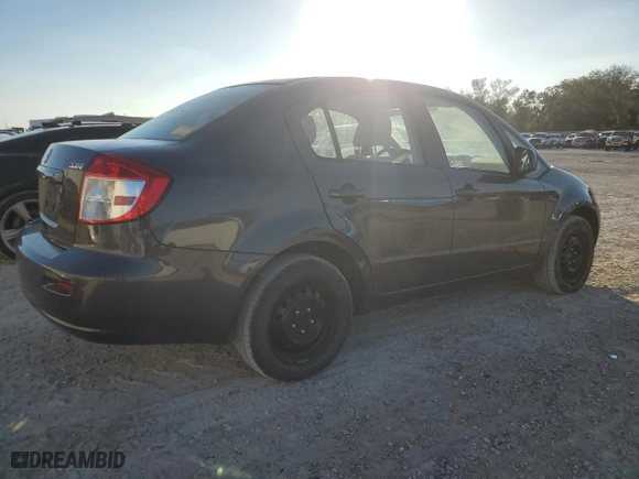2011 Suzuki SX4 LE with VIN JS2YC5A2XB6304661, listed as a Copart auction lot 81130714 with 70,827 mi miles and Clean Title. Bid and sale history available at carsss.com. Image 3.