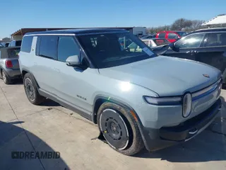 2025 Rivian R1S Adventure with VIN 7PDSGBBA5SN052535, listed as a IAAI auction lot 41200640 with 285 mi miles. Bid and sale history available at carsss.com. Image 1.