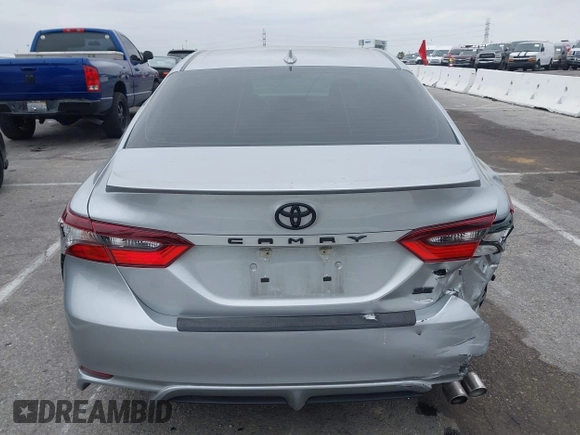 2023 Toyota Camry SE with VIN 4T1G11AKXPU809876, listed as a IAAI auction lot 42100546 with 35,055 mi miles and . Bid and sale history available at DreamBid. Image 16.
