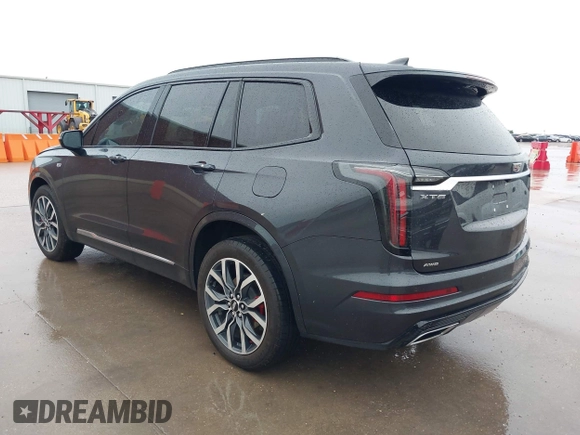 2023 Cadillac XT6 AWD Sport with VIN 1GYKPGRS0PZ177620, listed as a IAAI auction lot 42432423 with 24,070 mi miles and . Bid and sale history available at DreamBid. Image 3.