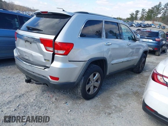2013 Jeep Grand Cherokee Limited with VIN 1C4RJEBG2DC578388, listed as a IAAI auction lot 41624008 with 182,970 mi miles. Bid and sale history available at carsss.com. Image 4.