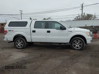 2014 Ford F-150 XL with VIN 1FTFW1EFXEFB08741, listed as a IAAI auction lot 40930645 with 138,394 mi miles and . Bid and sale history available at DreamBid. Image 13.