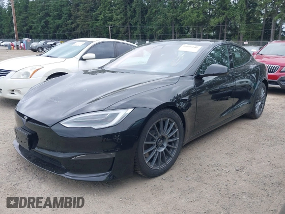2021 Tesla Model S Plaid with VIN 5YJSA1E62MF447509, listed as a IAAI auction lot 42509281 with 32,372 mi miles and . Bid and sale history available at DreamBid. Image 20.