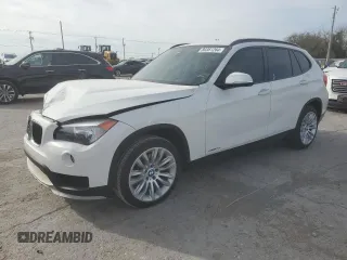 2015 BMW X1 sDrive28i with VIN WBAVM1C50FV498720, listed as a Copart auction lot 80381264 with 0 mi miles and Salvage Title. Bid and sale history available at carsss.com. Image 1.