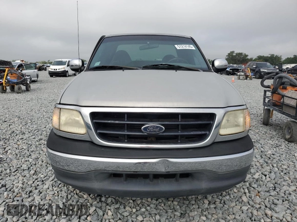 2000 Ford F-150 XL z VIN 2FTRX07L1YCA33404, wystawiony jako Copart lot #51214145 z przebiegiem Nie podano mil oraz Szkoda całkowita • Salvage title. Historia ofert i sprzedaży dostępna na DreamBid. Obrazek 5.