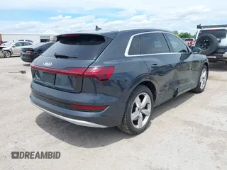 2019 Audi e-tron Premium Plus with VIN WA1LABGE6KB012565, listed as a IAAI auction lot 42220663 with 48,804 mi miles and . Bid and sale history available at DreamBid. Image 4.