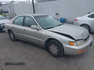1997 Honda Accord Value with VIN 1HGCD568XVA184006, listed as a IAAI auction lot 41818518 with 276,230 mi miles and . Bid and sale history available at carsss.com. Image 1.