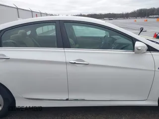 2012 Hyundai Sonata Hybrid with VIN KMHEC4A44CA038170, listed as a IAAI auction lot 41945015 with 90,404 mi miles and . Bid and sale history available at DreamBid. Image 14.