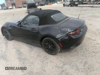 2021 Mazda MX-5 Miata Sport with VIN JM1NDAB73M0454064, listed as a IAAI auction lot 42613537 with 24,630 mi miles and . Bid and sale history available at DreamBid. Image 3.