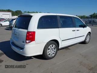 2015 Dodge Grand Caravan SE with VIN 2C4RDGBGXFR569435, listed as a IAAI auction lot 42057084 with 160,058 mi miles and . Bid and sale history available at DreamBid. Image 4.