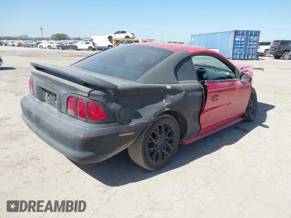 1997 Ford Mustang with VIN 1FALP4044VF195081, listed as a IAAI auction lot 41725150 with 124,009 mi miles. Bid and sale history available at carsss.com. Image 4.