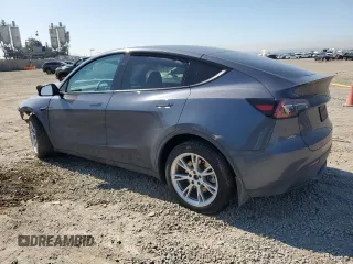 2023 Tesla Model Y Long Range with VIN 7SAYGDEE2PA164405, listed as a Copart auction lot 50085905 with 42,156 mi miles and Salvage Title. Bid and sale history available at DreamBid. Image 2.