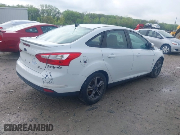 2014 Ford Focus SE with VIN 1FADP3F29EL353274, listed as a IAAI auction lot 42114579 with 140,937 mi miles and . Bid and sale history available at carsss.com. Image 4.