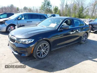 2019 BMW 3 Series 330i xDrive with VIN WBA5R7C59KFH30971, listed as a IAAI auction lot 42005244 with 59,514 mi miles and . Bid and sale history available at DreamBid. Image 2.