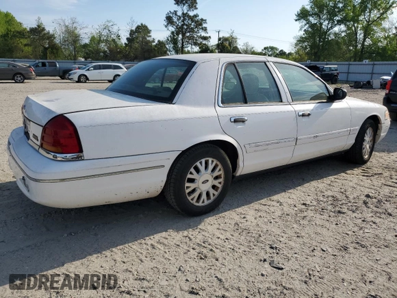 2003 Ford Crown Victoria LX z VIN 2FAFP74W03X209148, wystawiony jako Copart lot #53274575 z przebiegiem 127 739 mil mil oraz Szkody całkowita. Historia ofert i sprzedaży dostępna na DreamBid. Obrazek 3.