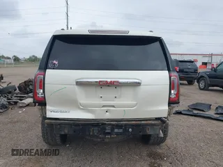 2015 GMC Yukon Denali z VIN 1GKS1CKJ3FR713531, wystawiony jako IAAI lot #41866691 z przebiegiem 157 666 mil mil oraz . Historia ofert i sprzedaży dostępna na DreamBid. Obrazek 17.
