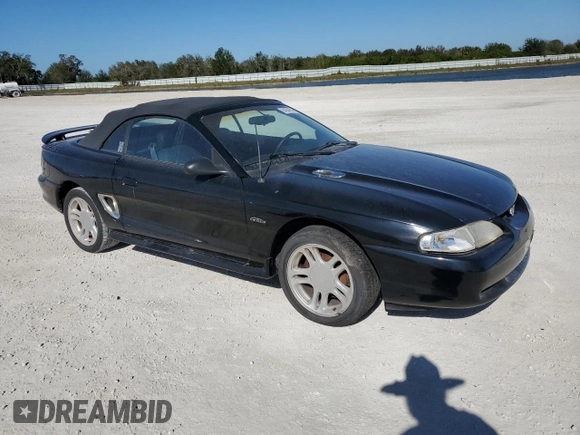 1996 Ford Mustang GT with VIN 1FALP45X3TF204806, listed as a Copart auction lot 84204974 with 137,676 mi miles and Salvage Title. Bid and sale history available at carsss.com. Image 4.