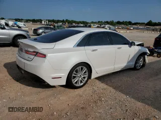 2014 Lincoln MKZ z VIN 3LN6L2G90ER820731, wystawiony jako Copart lot #57818185 z przebiegiem 133 133 mil mil oraz Szkoda całkowita • Salvage title. Historia ofert i sprzedaży dostępna na DreamBid. Obrazek 3.