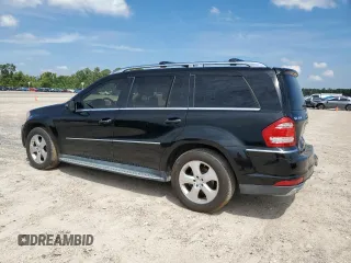 2011 Mercedes-Benz GL-Class GL 450 with VIN 4JGBF7BEXBA708581, listed as a Copart auction lot 69159824 with 151,477 mi miles and Salvage Title. Bid and sale history available at carsss.com. Image 2.