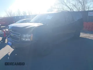 2013 Chevrolet Suburban LS with VIN 1GNSKHE76DR155667, listed as a IAAI auction lot 41053774 with 118,655 mi miles. Bid and sale history available at carsss.com. Image 2.