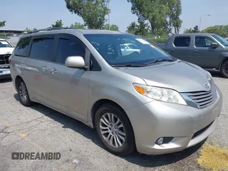 2015 Toyota Sienna XLE with VIN 5TDYK3DC4FS560743, listed as a IAAI auction lot 42488745 with 145,009 mi miles and . Bid and sale history available at DreamBid. Image 1.