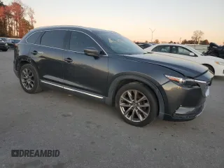 2019 Mazda CX-9 Grand Touring with VIN JM3TCADY7K0313051, listed as a Copart auction lot 83366274 with 118,751 mi miles and Clean Title. Bid and sale history available at carsss.com. Image 4.