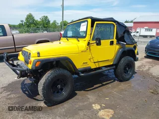 2005 Jeep Wrangler Sport z VIN 1J4FA49S65P381798, wystawiony jako IAAI lot #42305109 z przebiegiem 71 880 mil mil oraz . Historia ofert i sprzedaży dostępna na DreamBid. Obrazek 2.