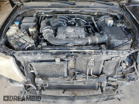 2009 Nissan Frontier LE with VIN 1N6AD09U79C409698, listed as a Copart auction lot 55843545 with 230,334 mi miles and Salvage title. Bid and sale history available at DreamBid. Image 11.