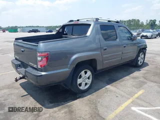 2013 Honda Ridgeline RTL with VIN 5FPYK1F5XDB012354, listed as a IAAI auction lot 42392921 with 248,223 mi miles and . Bid and sale history available at DreamBid. Image 4.