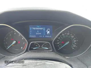 2012 Ford Focus SE z VIN 1FAHP3K21CL444088, wystawiony jako IAAI lot #42242725 z przebiegiem 145 604 mil mil oraz . Historia ofert i sprzedaży dostępna na DreamBid. Obrazek 7.