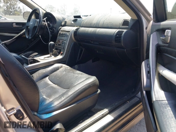 2003 Infiniti G35 z VIN JNKCV51E83M313850, wystawiony jako IAAI lot #42086580 z przebiegiem 91 822 mil mil oraz . Historia ofert i sprzedaży dostępna na DreamBid. Obrazek 5.