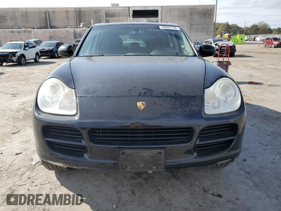 2005 Porsche Cayenne S with VIN WP1AB29PX5LA61015, listed as a Copart auction lot 76097734 with 106,331 mi miles and Salvage Title. Bid and sale history available at carsss.com. Image 5.