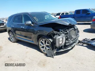 2020 Hyundai Palisade SEL z VIN KM8R34HE7LU091654, wystawiony jako IAAI lot #41809048 z przebiegiem 87 984 mil mil oraz . Historia ofert i sprzedaży dostępna na DreamBid. Obrazek 1.