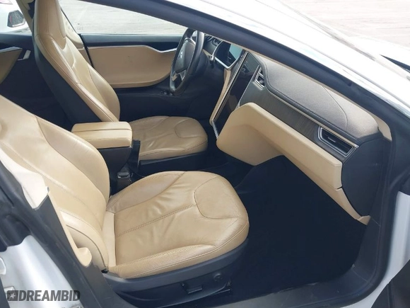 2013 Tesla Model S with VIN 5YJSA1CG2DFP20928, listed as a IAAI auction lot 41895493 with 131,432 mi miles. Bid and sale history available at carsss.com. Image 5.