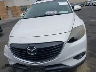 2015 Mazda CX-9 Grand Touring z VIN JM3TB2DV9F0458340, wystawiony jako IAAI lot #42021843 z przebiegiem 145 929 mil mil oraz . Historia ofert i sprzedaży dostępna na DreamBid. Obrazek 13.