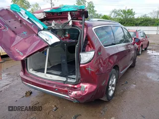 2017 Chrysler Pacifica Limited z VIN 2C4RC1GG8HR703435, wystawiony jako IAAI lot #42156060 z przebiegiem 129 744 mil mil oraz . Historia ofert i sprzedaży dostępna na DreamBid. Obrazek 4.