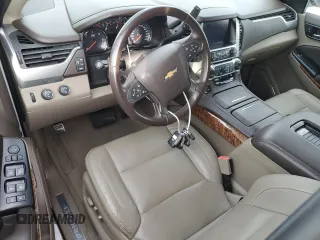 2019 Chevrolet Suburban Premier with VIN 1GNSKJKCXKR154480, listed as a Copart auction lot 77226834 with 24,683 mi miles and Non Repairable. Bid and sale history available at DreamBid. Image 8.